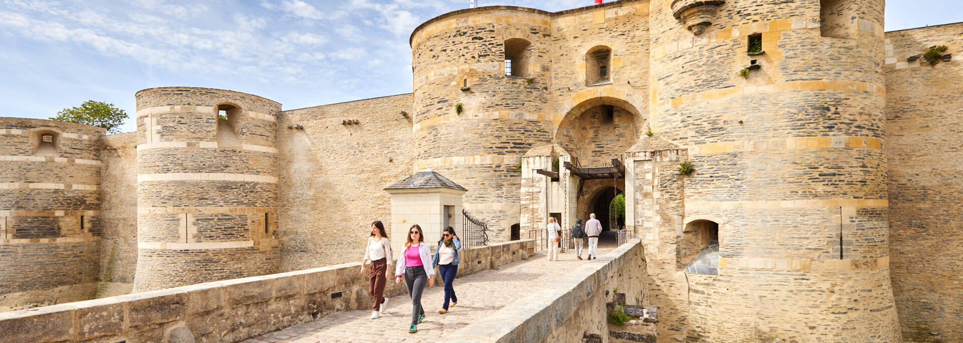Three young women leaving the fortress