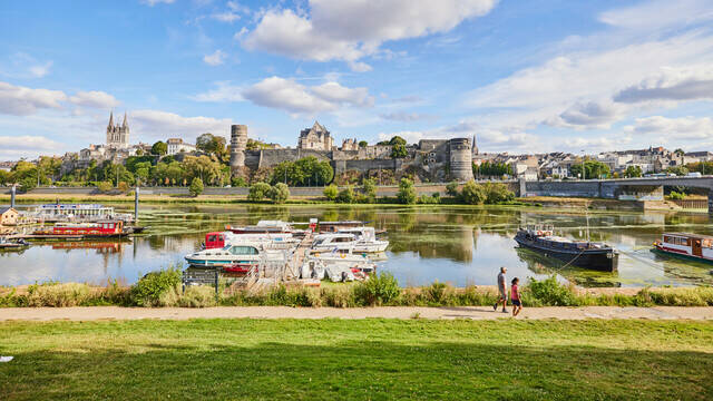 Wide shot of the port with a view of the castle and cathedral of Angers