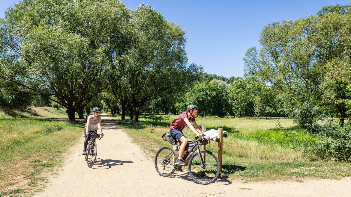 Cyclists gravelling and bikepacking in the heart of Balzac Park