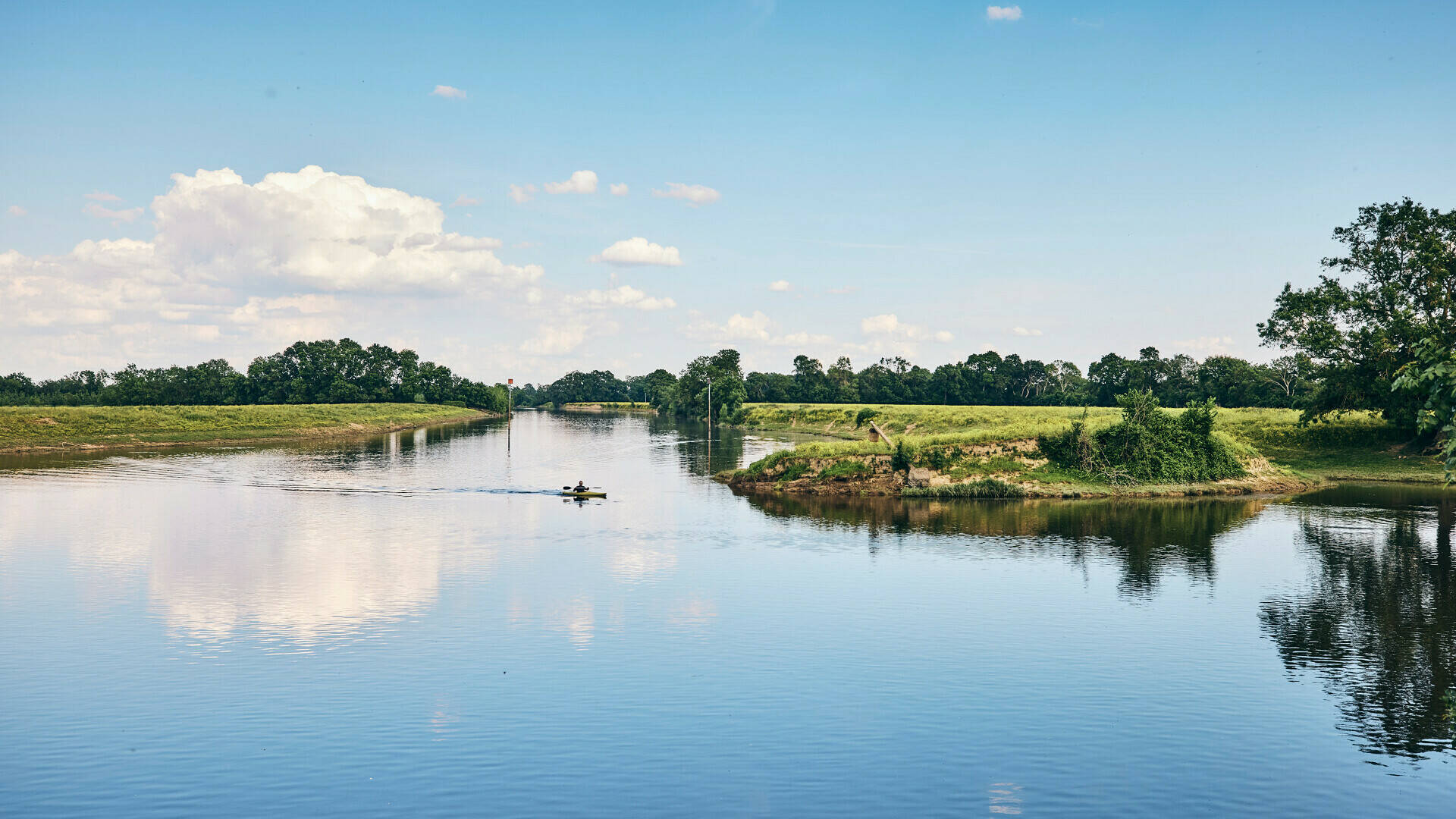 Wide shot of the river and the sky