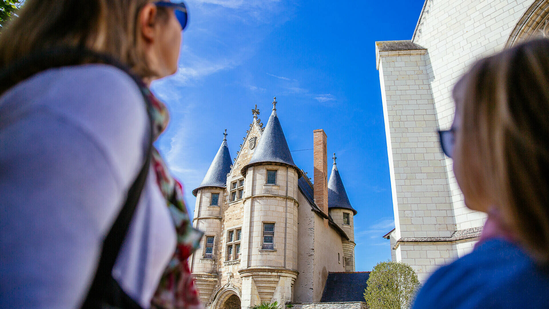 A mother and daughter looking at the gatehouse