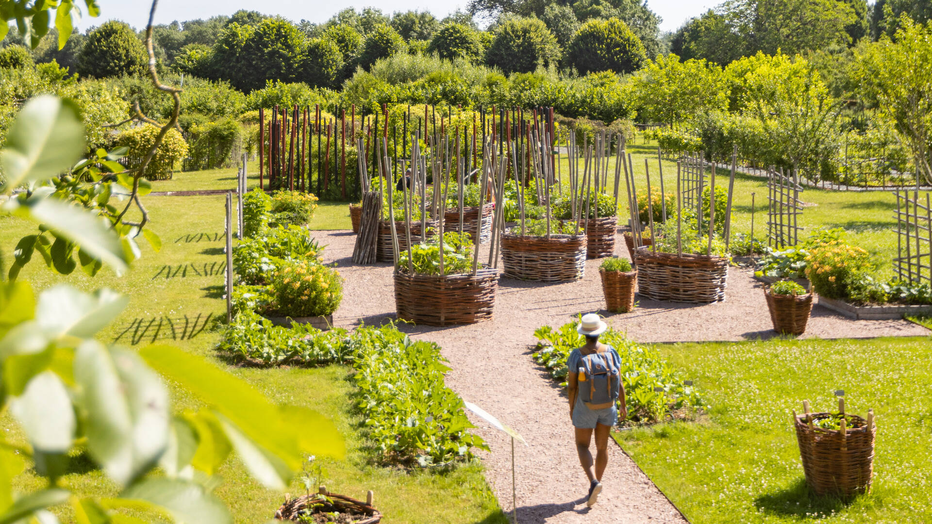 Man walking in the gardens of Puygirault