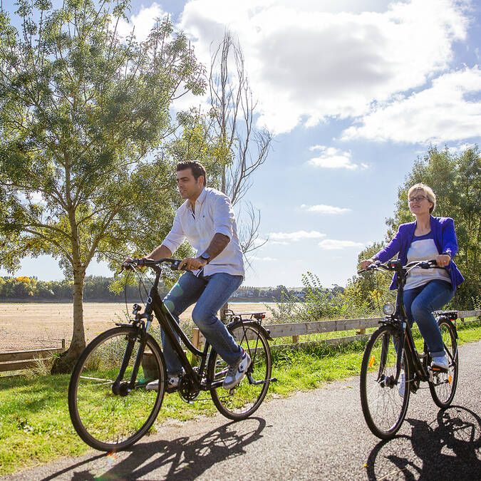 Couple cycling along the Loire